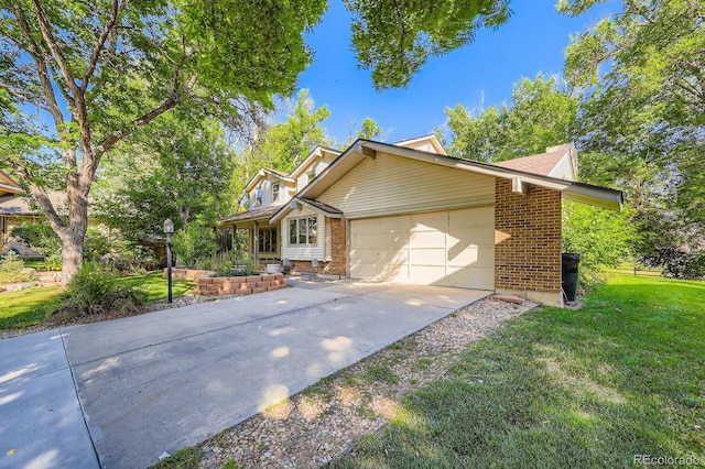 4878 W 98th Ave, Westminster, CO 80031 - view of front facade with a garage, brick siding, a front yard, and concrete driveway