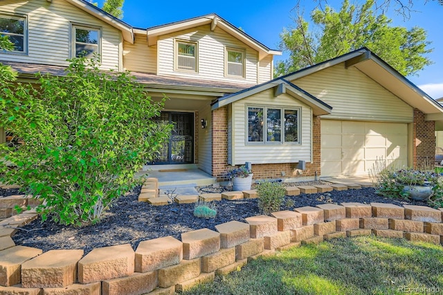 4878 W 98th Ave, Westminster, CO 80031 - traditional-style house with brick siding, an attached garage, covered porch, and roof with shingles