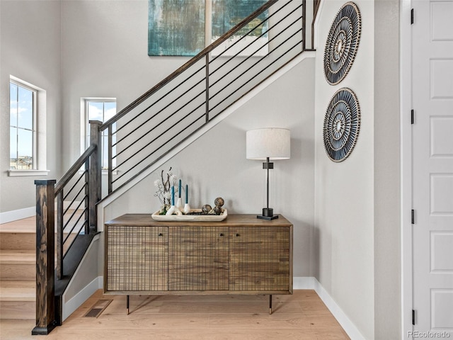 staircase featuring hardwood / wood-style floors