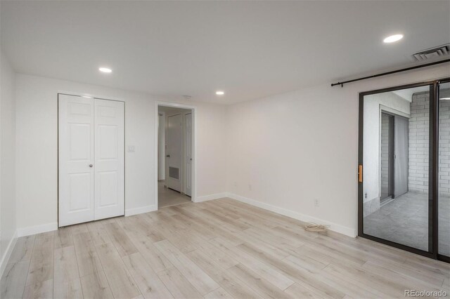 800 N Pearl St Unit 611, Denver, CO 80203 - unfurnished bedroom featuring light wood-type flooring, recessed lighting, baseboards, and a closet