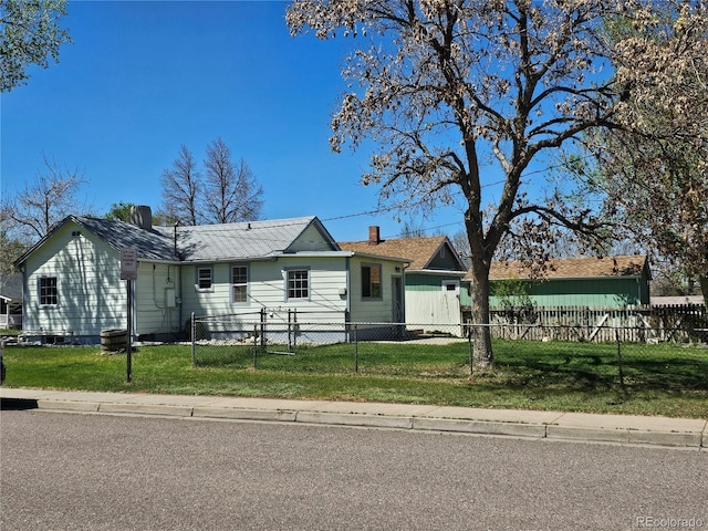 3798 S Grant St, Englewood, CO 80113 - ranch-style house with a fenced front yard, a front yard, and a chimney