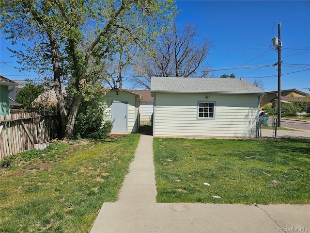 3798 S Grant St, Englewood, CO 80113 - exterior space with fence, an outdoor structure, and a storage unit