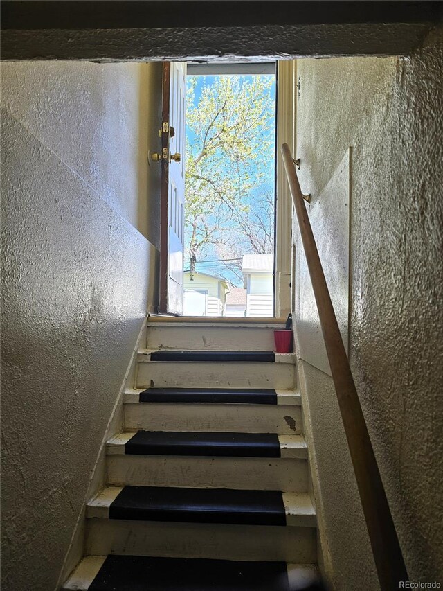 3798 S Grant St, Englewood, CO 80113 - stairway with a textured wall