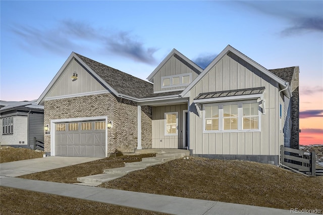 view of front of home with a garage