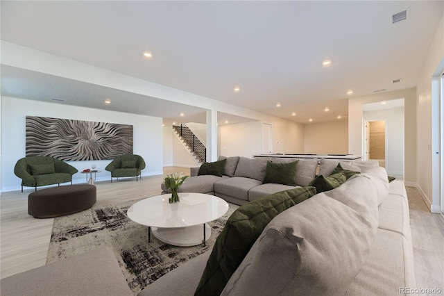 living room featuring light wood-type flooring