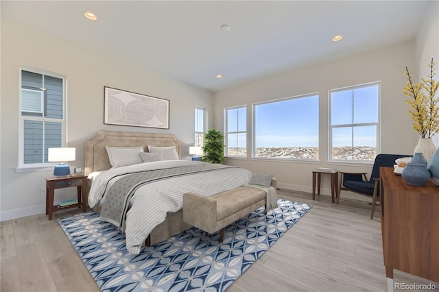 bedroom with light wood-type flooring