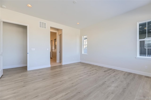 unfurnished bedroom with light hardwood / wood-style floors