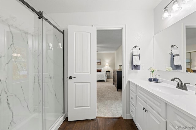 1285 Aberdeen Dr, Broomfield, CO 80020 - bathroom with ensuite bathroom, vanity, a marble finish shower, and wood finished floors