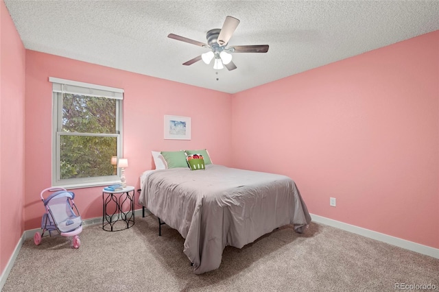 1285 Aberdeen Dr, Broomfield, CO 80020 - bedroom with carpet floors, a textured ceiling, baseboards, and a ceiling fan