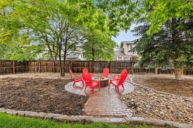 1285 Aberdeen Dr, Broomfield, CO 80020 - fenced backyard featuring a patio area and an outdoor fire pit