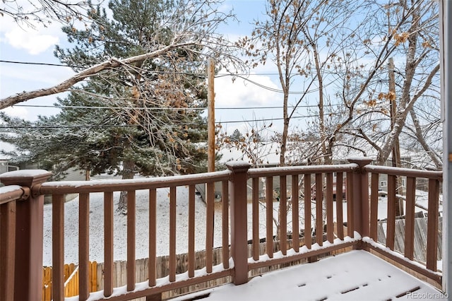 view of snow covered deck