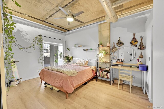 290 W 12th Ave Unit 205, Denver, CO 80204 - bedroom with wood finished floors and ceiling fan