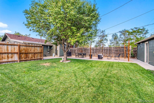 view of yard with a patio area