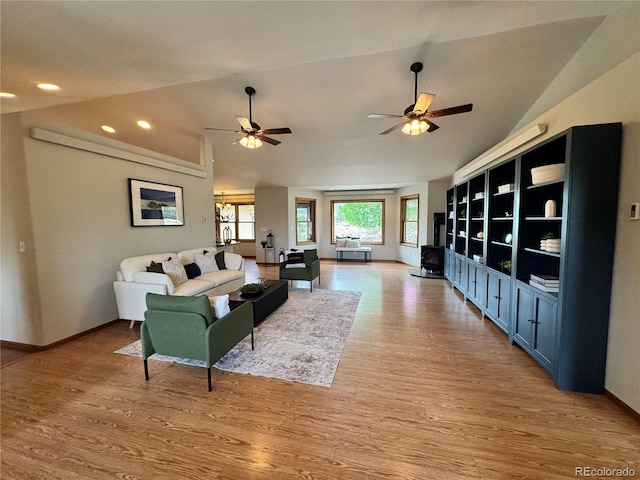 100 River Run Dr, Buena Vista, CO 81211 - living room with vaulted ceiling, a ceiling fan, light wood-style flooring, and recessed lighting