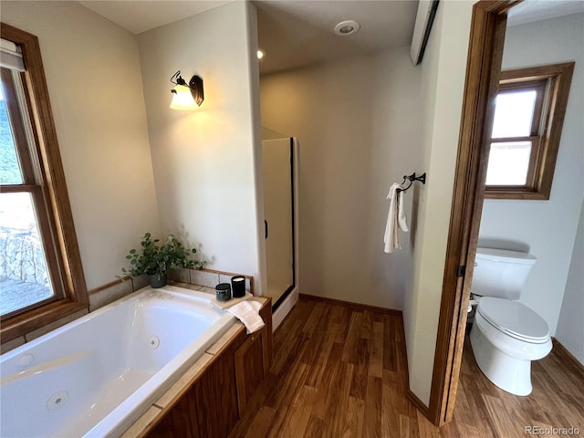 100 River Run Dr, Buena Vista, CO 81211 - bathroom with wood finished floors, a tub with jets, and a shower stall