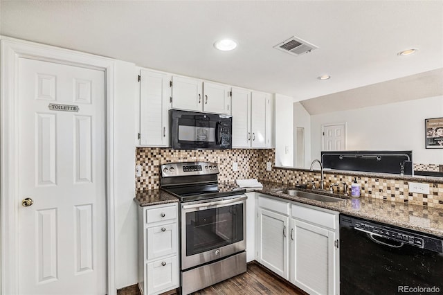 kitchen with black appliances, white cabinets, dark wood-type flooring, sink, and backsplash