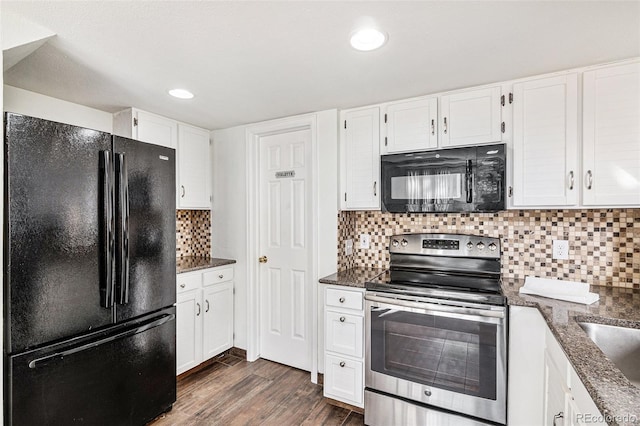 kitchen featuring black appliances, tasteful backsplash, white cabinets, dark hardwood / wood-style flooring, and dark stone counters