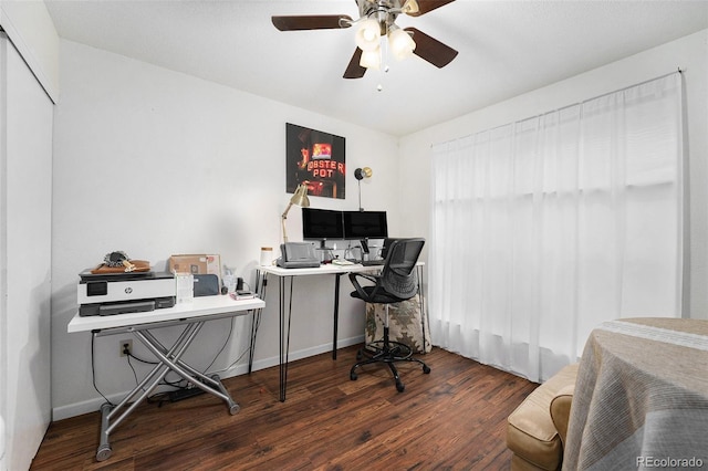 home office with wood finished floors, ceiling fan, and baseboards