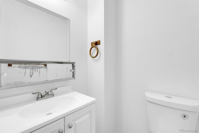1287 Soaring Eagle Dr, Colorado Springs, CO 80915 - half bathroom featuring toilet and vanity