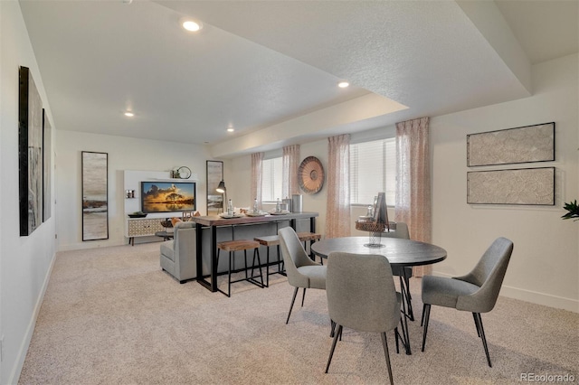 dining area with light carpet