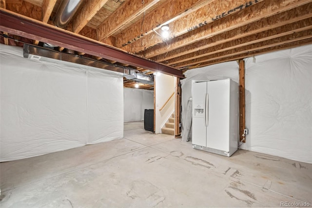 10681 Cherrybrook Cir, Highlands Ranch, CO 80126 - unfinished basement with white refrigerator with ice dispenser and stairs