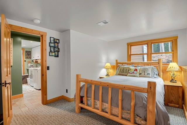 8905 Carol Ln, Conifer, CO 80433 - bedroom with independent washer and dryer and baseboards