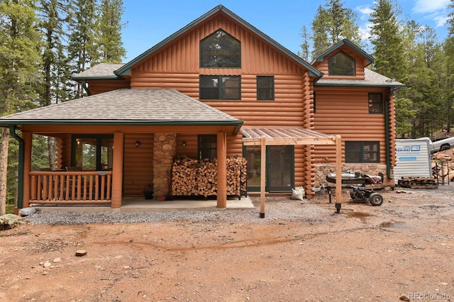 8905 Carol Ln, Conifer, CO 80433 - log home with log exterior and a shingled roof