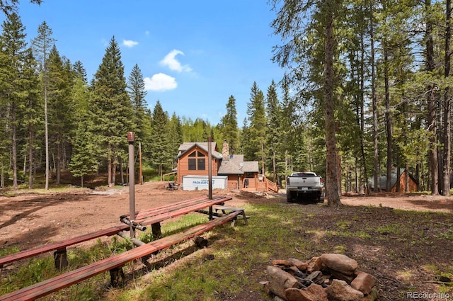 8905 Carol Ln, Conifer, CO 80433 - view of yard with a forest view