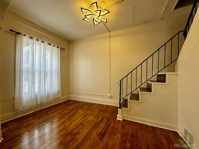 interior space with dark hardwood / wood-style flooring