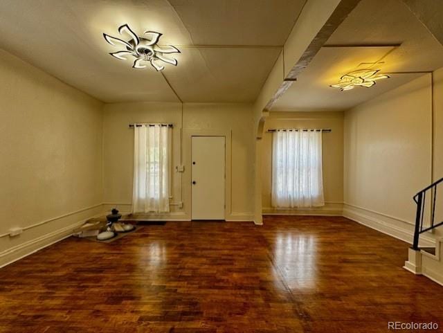 entrance foyer with dark hardwood / wood-style flooring