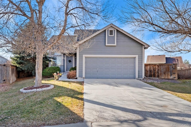 single story home with a garage and a front lawn