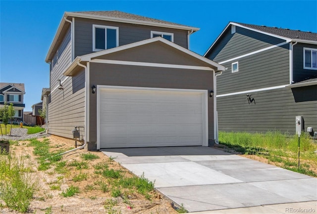 exterior space with a garage