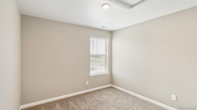 view of carpeted spare room