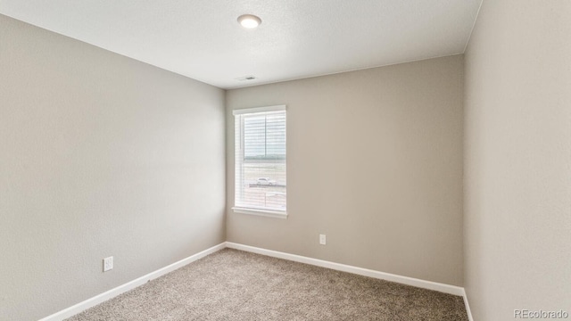 empty room with carpet floors