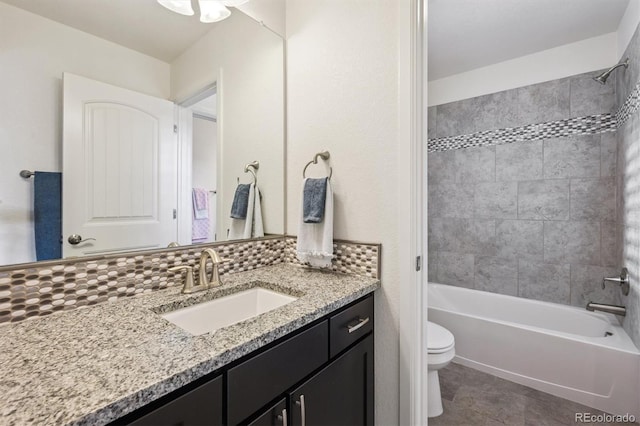 2234 S Nile St, Denver, CO 80228 - bathroom with vanity, washtub / shower combination, and tile patterned floors