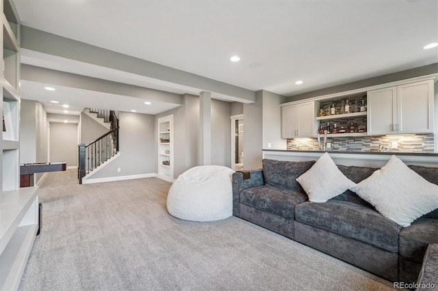 2234 S Nile St, Denver, CO 80228 - living area with light colored carpet, stairway, recessed lighting, and bar area