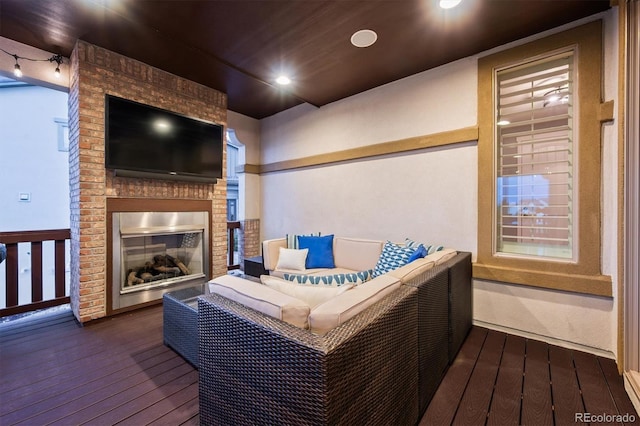 2234 S Nile St, Denver, CO 80228 - wooden terrace with an outdoor living space with a fireplace
