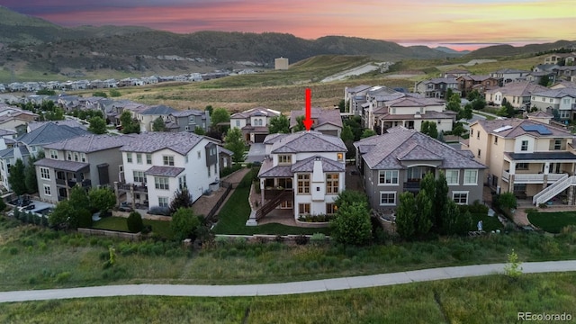2234 S Nile St, Denver, CO 80228 - aerial view at dusk of a residential view and a mountain view