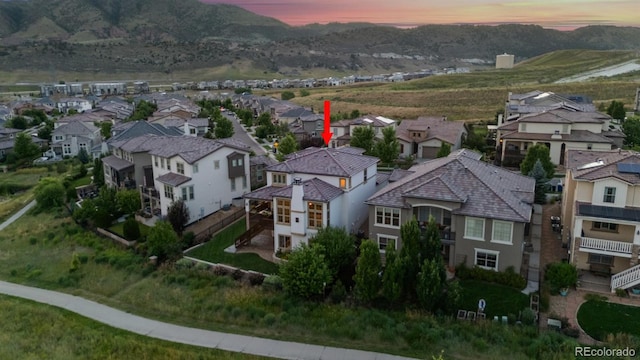 2234 S Nile St, Denver, CO 80228 - aerial view at dusk of a residential view and a mountain view
