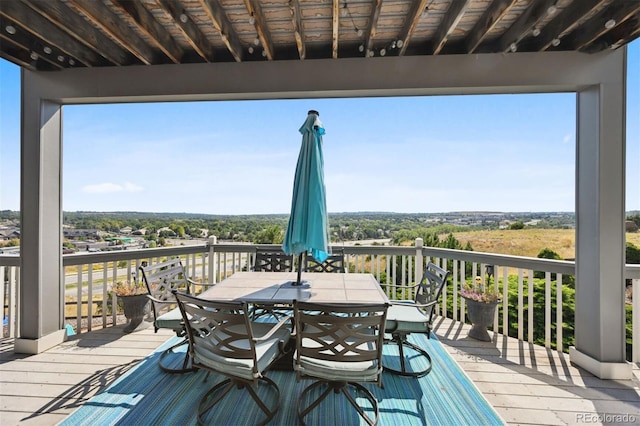 10520 W Vassar Dr, Lakewood, CO 80227 - wooden terrace featuring outdoor dining space