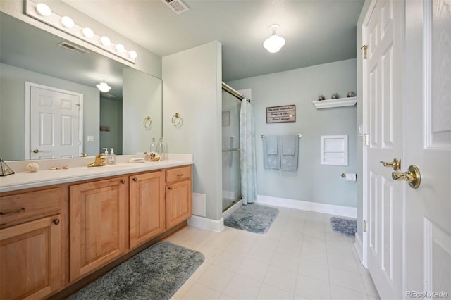 10520 W Vassar Dr, Lakewood, CO 80227 - bathroom featuring vanity, a shower stall, and baseboards