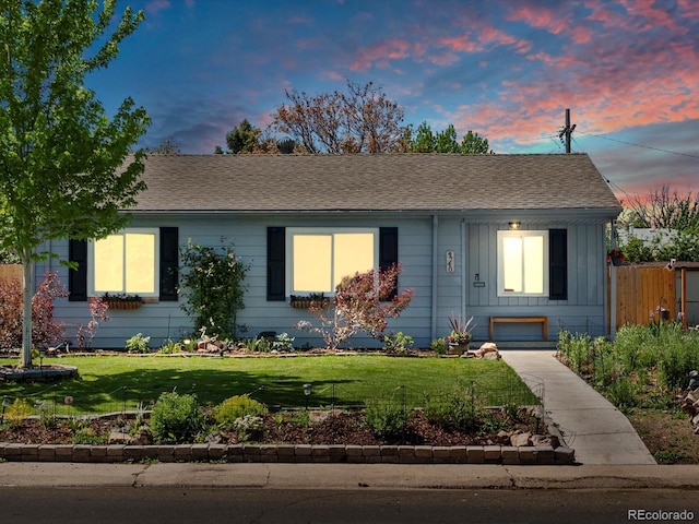 4740 W Wyoming Pl, Denver, CO 80219 - ranch-style house with a shingled roof