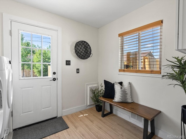4740 W Wyoming Pl, Denver, CO 80219 - entryway with light wood-style flooring and baseboards