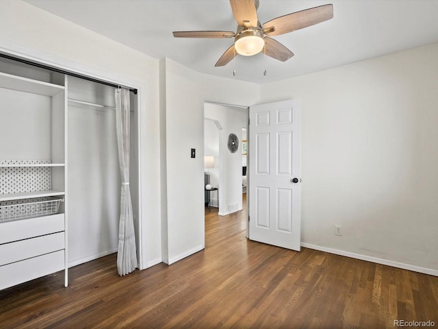 4740 W Wyoming Pl, Denver, CO 80219 - unfurnished bedroom with wood finished floors, a closet, baseboards, and ceiling fan