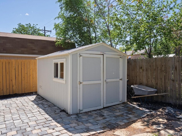 4740 W Wyoming Pl, Denver, CO 80219 - view of shed with a fenced backyard