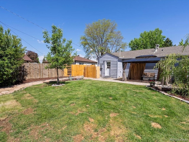 4740 W Wyoming Pl, Denver, CO 80219 - view of yard featuring a patio area