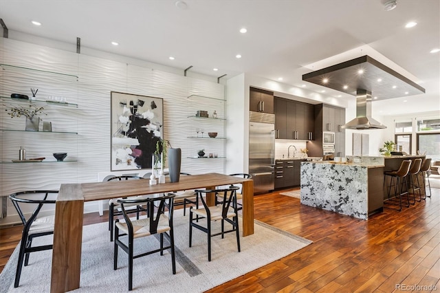 370 Garfield St, Denver, CO 80206 - dining area featuring dark wood-type flooring and recessed lighting