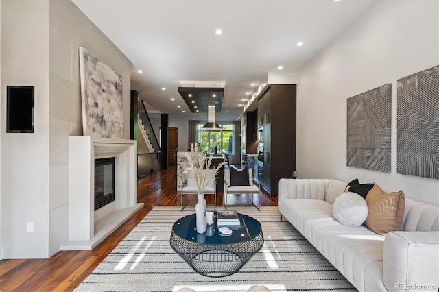 370 Garfield St, Denver, CO 80206 - living room featuring wood finished floors, stairway, recessed lighting, and a glass covered fireplace