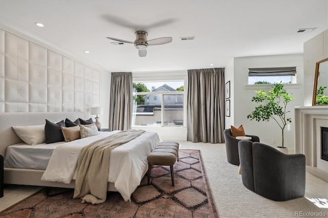 370 Garfield St, Denver, CO 80206 - bedroom with multiple windows, carpet, a glass covered fireplace, and ceiling fan