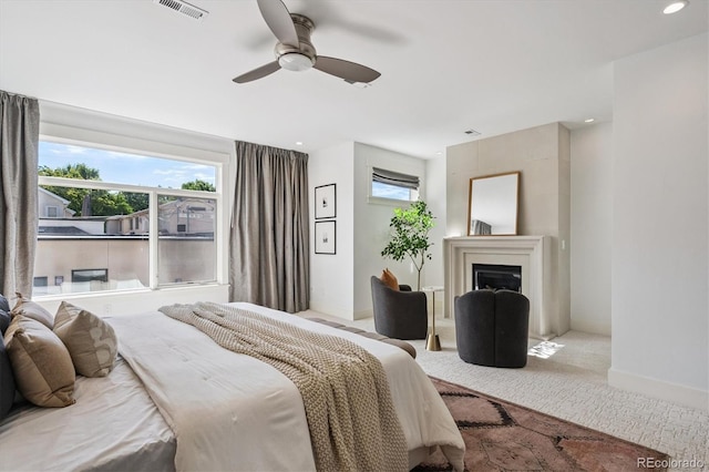 370 Garfield St, Denver, CO 80206 - carpeted bedroom with a fireplace, a ceiling fan, and recessed lighting